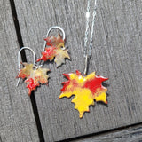 Maple leaf earrings in enamel