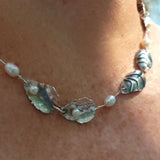 Oyster shells with pearls necklace
