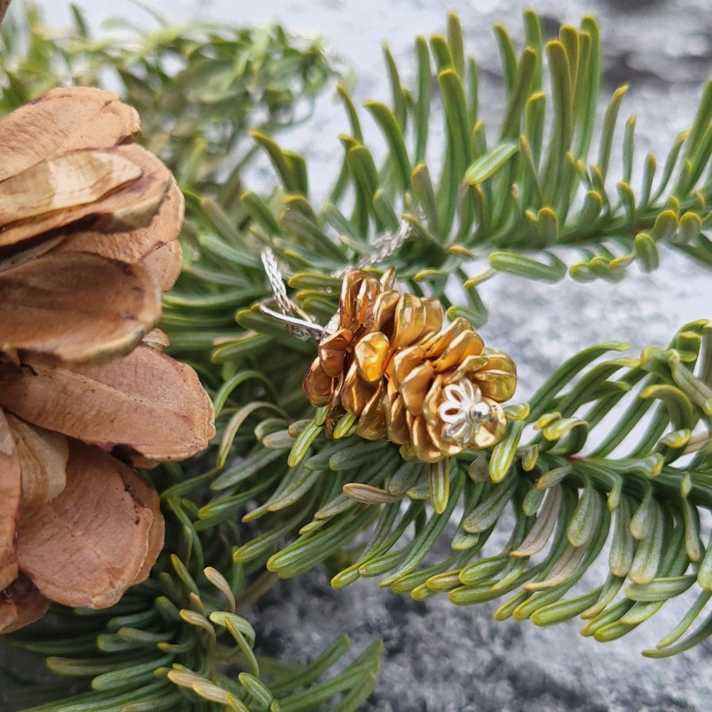 Immerse in Nature's Poetry: Hand-Crafted Brass Pinecone Pendant